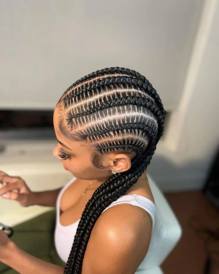 Sleek feed-in stitch braids with clean precise parting lines at SS BRAIDS GH (ssbraidsgh)